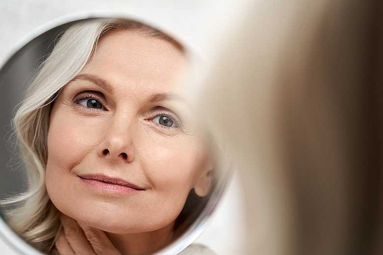 Women Looking in Mirror